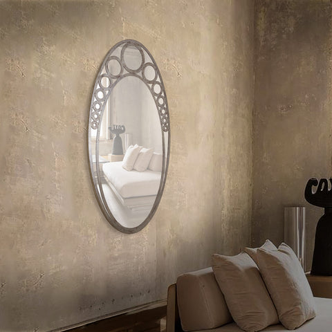 "Modern Circoval Mirror from Daleenz Store featuring an elegant oval design with a minimalist frame, mounted on a stylish modern wall."

