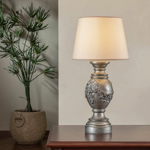 Classic Fiyounka Table Lamp with elegant bow design on wooden side table – warm ambient lighting for modern and classic interiors.

