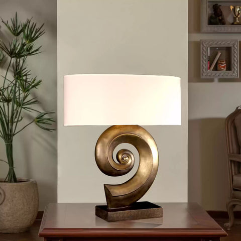 Modern KOCIE Table Lamp with minimalist curved design, soft ambient lighting, and sleek black finish – perfect for modern home decor