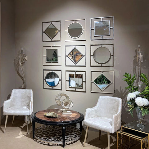 "Modern S – O Mirrors Set from Daleenz Store featuring two sleek, interlocking mirrors with a contemporary design, styled in a modern living room."

