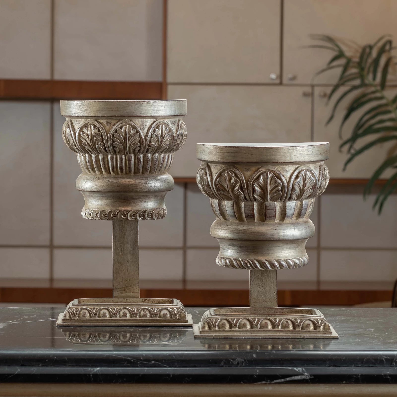 Classic Spiro Capital Stand table accessory with architectural column design, styled as an elegant décor piece on a modern tabletop.

