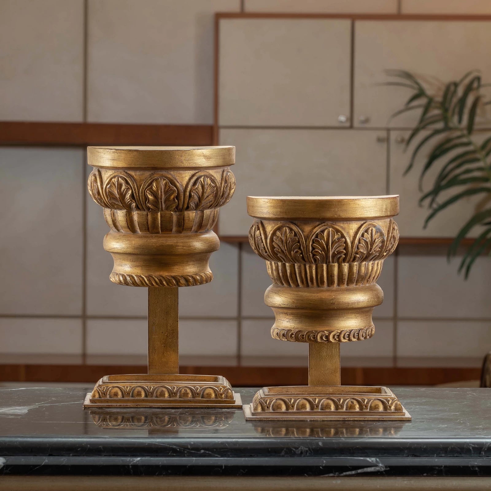 Classic Spiro Capital Stand table accessory with architectural column design, styled as an elegant décor piece on a modern tabletop.

