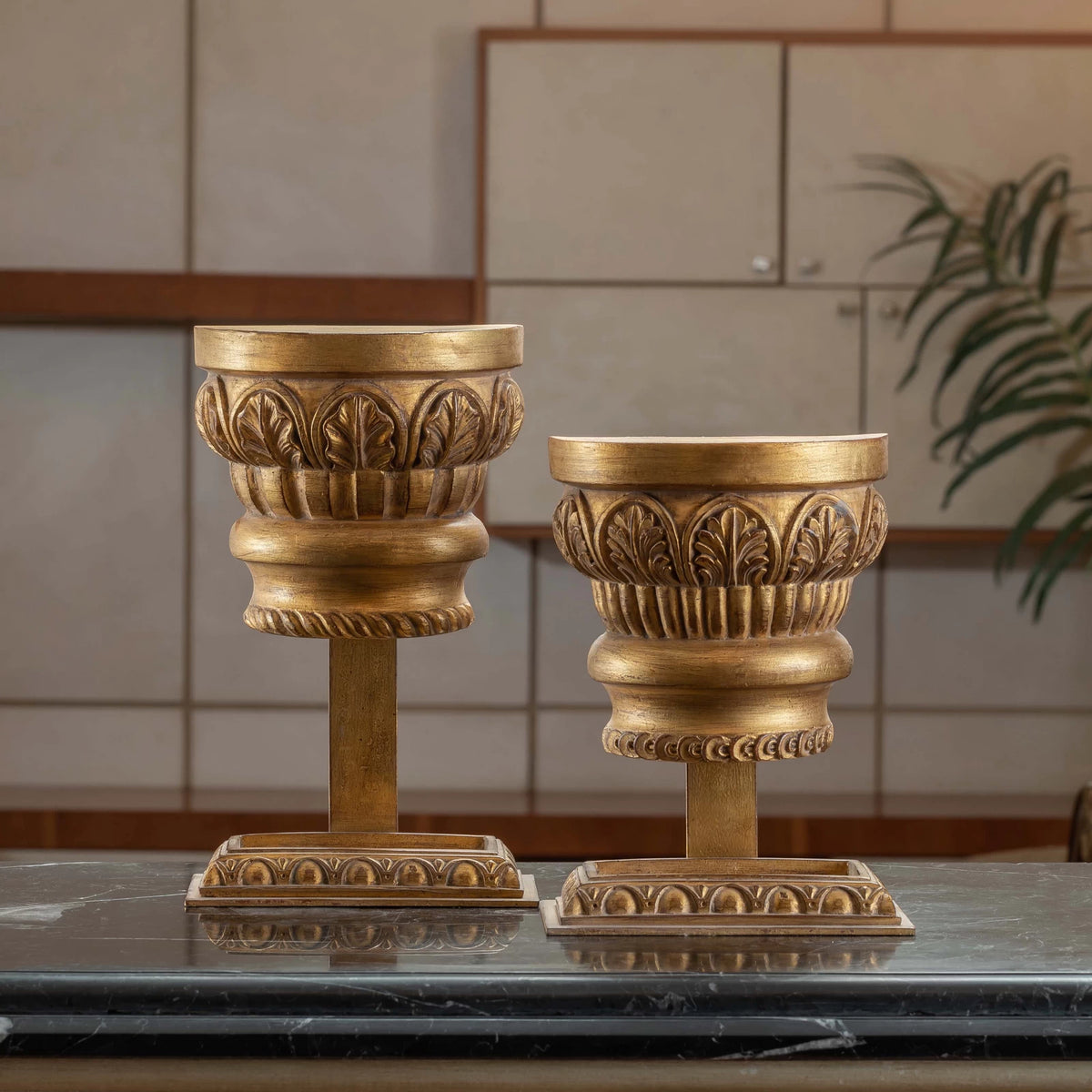 Classic Spiro Capital Stand table accessory with architectural column design, styled as an elegant décor piece on a modern tabletop.

