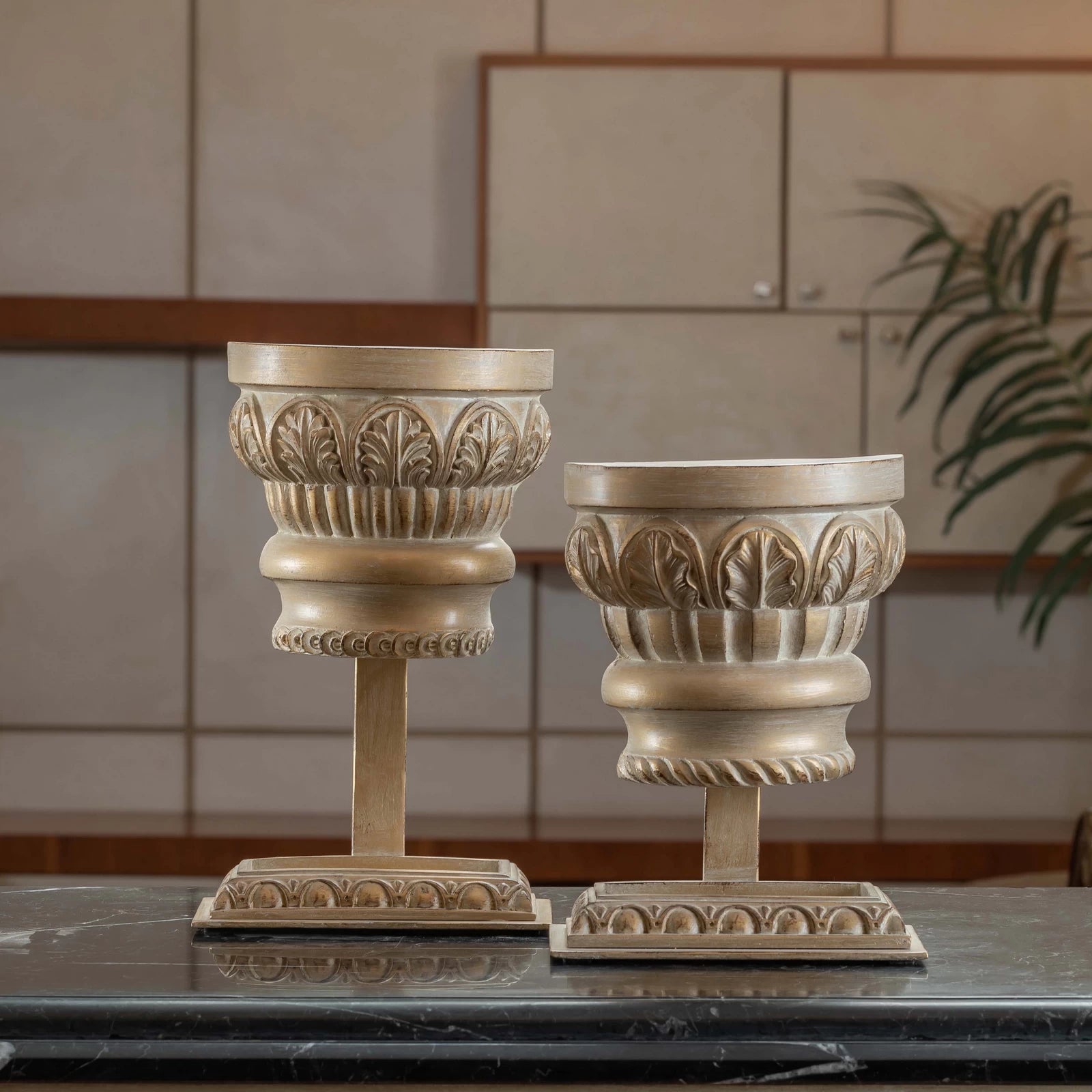 Classic Spiro Capital Stand table accessory with architectural column design, styled as an elegant décor piece on a modern tabletop.

