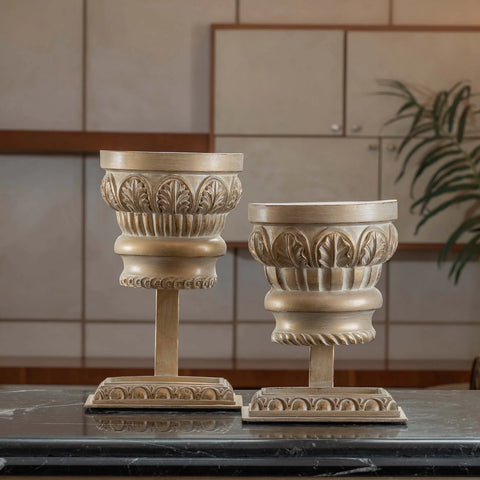 Classic Spiro Capital Stand table accessory with architectural column design, styled as an elegant décor piece on a modern tabletop.

