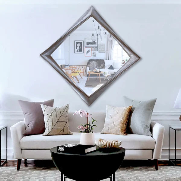 Modern 120cm square mirror with a twisted frame design, mounted on a wall as a bold, contemporary décor centerpiece.

