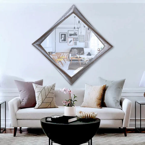Modern 120cm square mirror with a twisted frame design, mounted on a wall as a bold, contemporary décor centerpiece.


