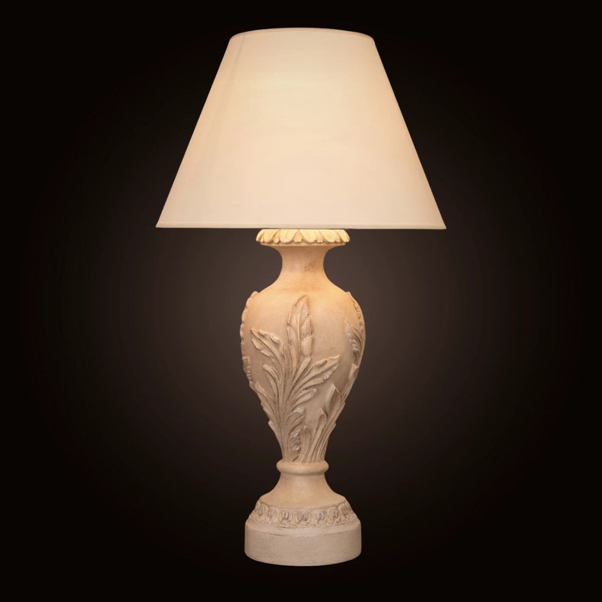 Modern Table Lamp Forest with minimalist tree-inspired design, softly glowing on a wooden nightstand in a cozy living room setting.

