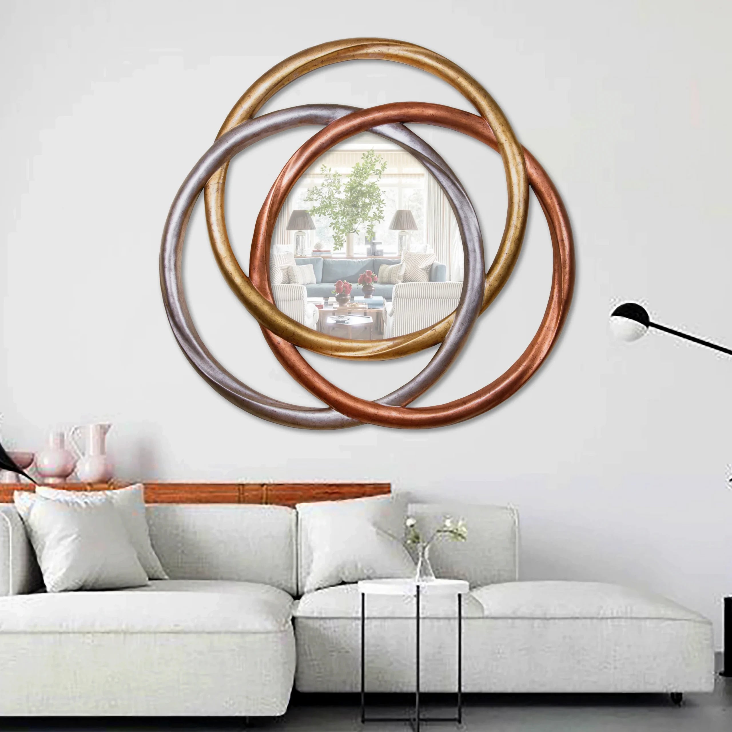 "Modern Trecedess Mirror from Daleenz Store featuring a unique, artistic shape with a sleek modern finish, displayed in a stylish contemporary space."

