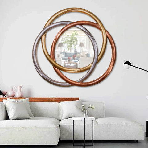 "Modern Trecedess Mirror from Daleenz Store featuring a unique, artistic shape with a sleek modern finish, displayed in a stylish contemporary space."

